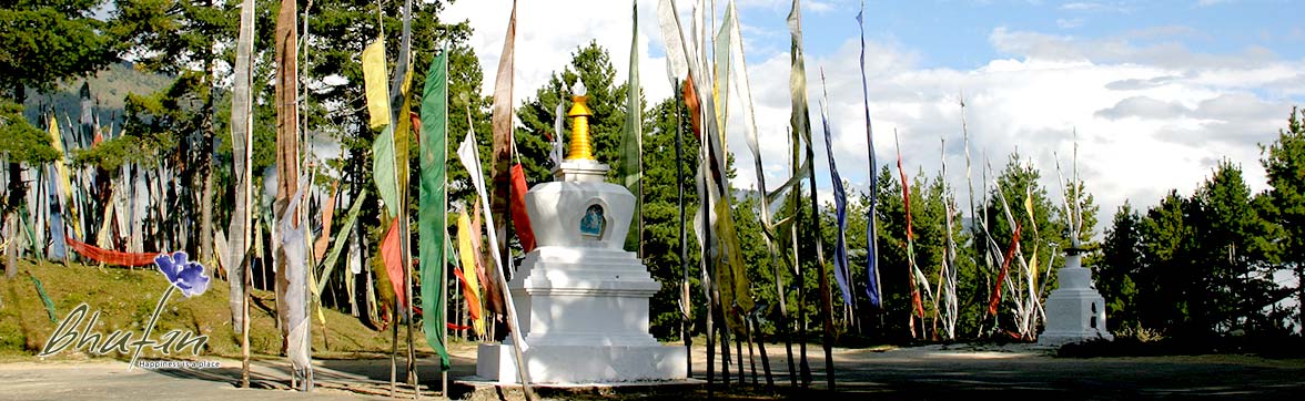 Stupa with prayer flags Central Bhutan Tour